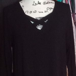 Kim Rogers black V neck dress with  Criss cross